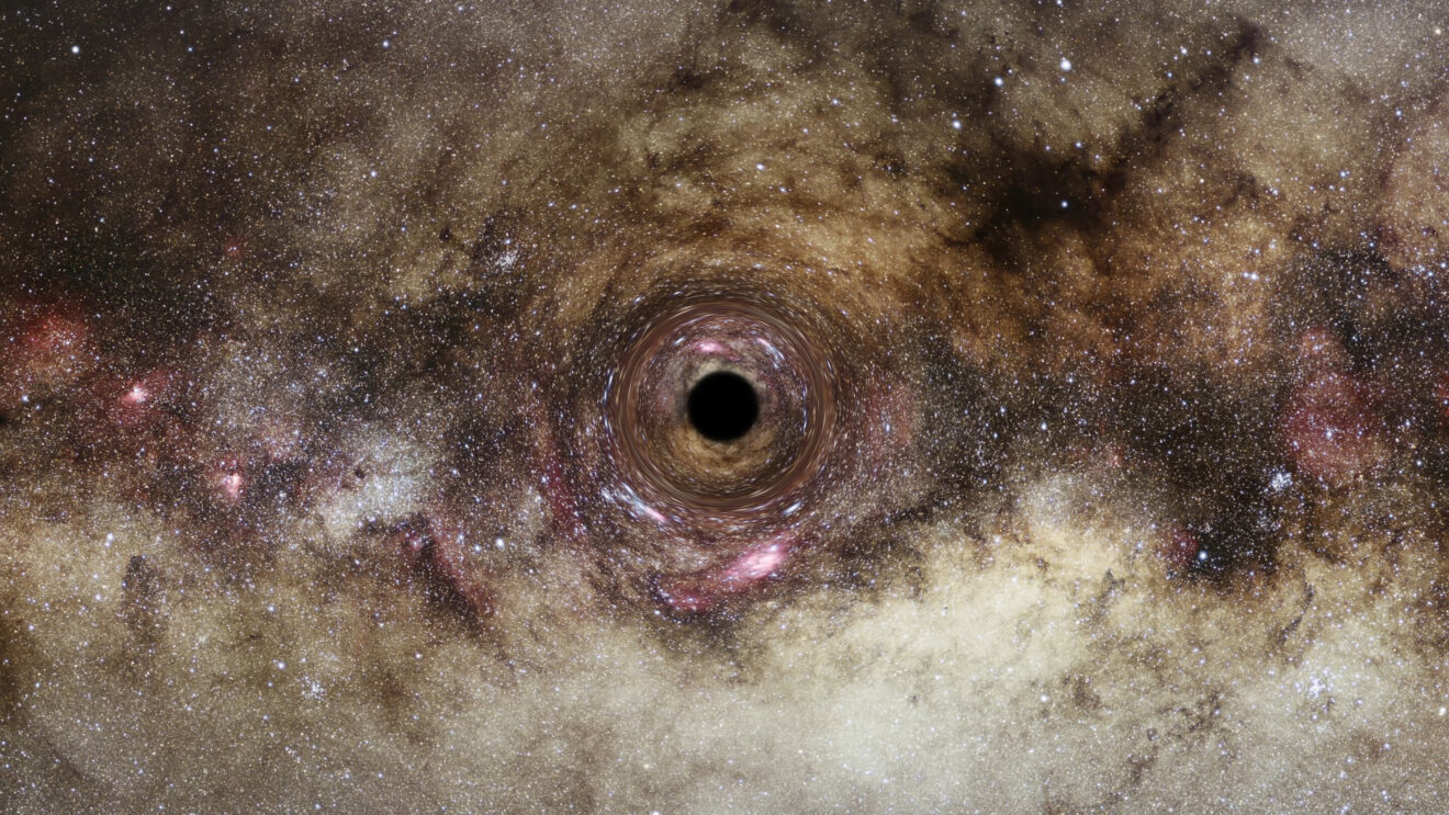 Kolossaal zwaar zwart gat ontdekt dankzij een zwaartekrachtlens