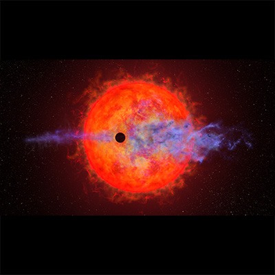 Hubble ziet dat de verdampende planeet AU Microscopii b de hik heeft