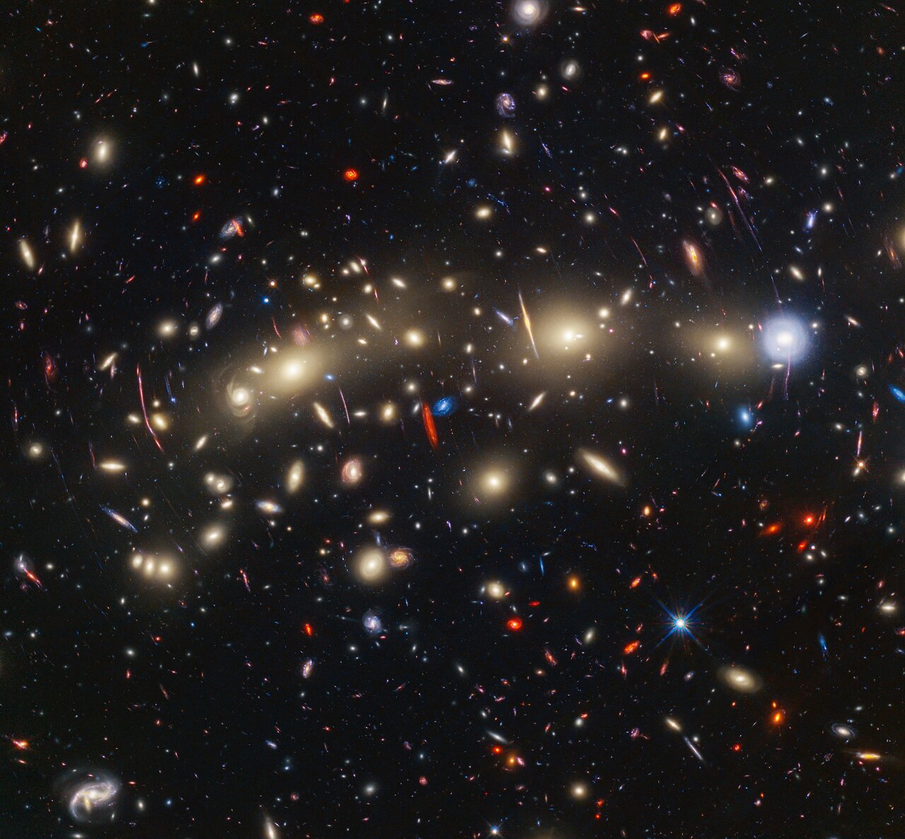 Webb en Hubble hebben een zeer kleurrijke foto gemaakt van cluster MACS0416
